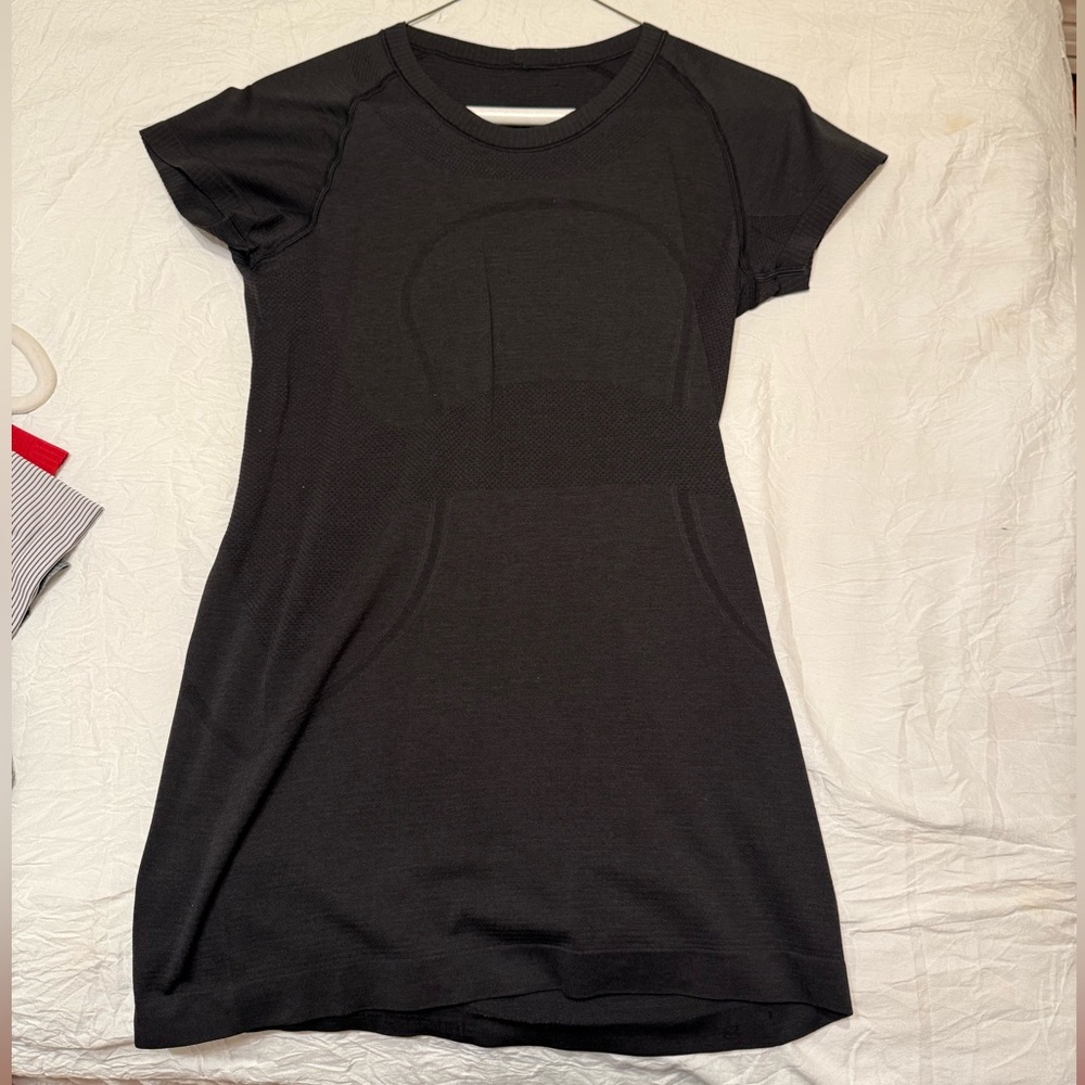 Black Lululemon swift tee. Size 8. No tags. No stains or pilling.